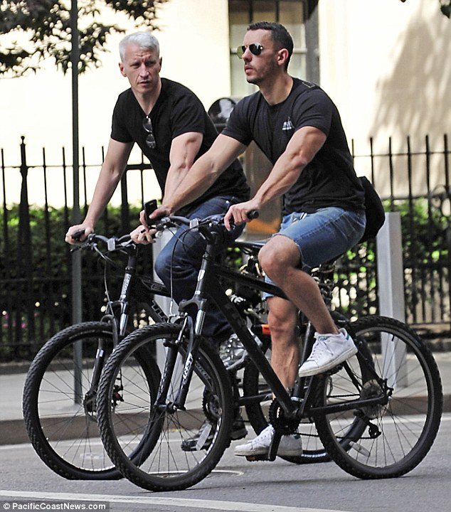 Anderson Cooper riding a bicycle Anderson Cooper riding a bicycle